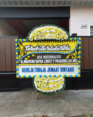 Papan Bunga Duka di Pancuran Pinang